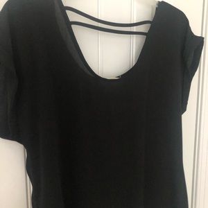 Black top, slightly open back